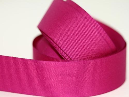 Magenta gross grain ribbon on the roll