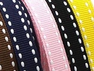A run of gross grain ribbon in mixed shades